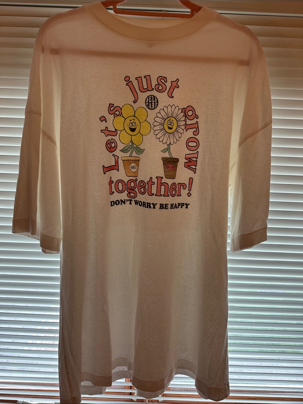 Topshop Cream Graphic Tee with Yellow & Pink Flower Characters
